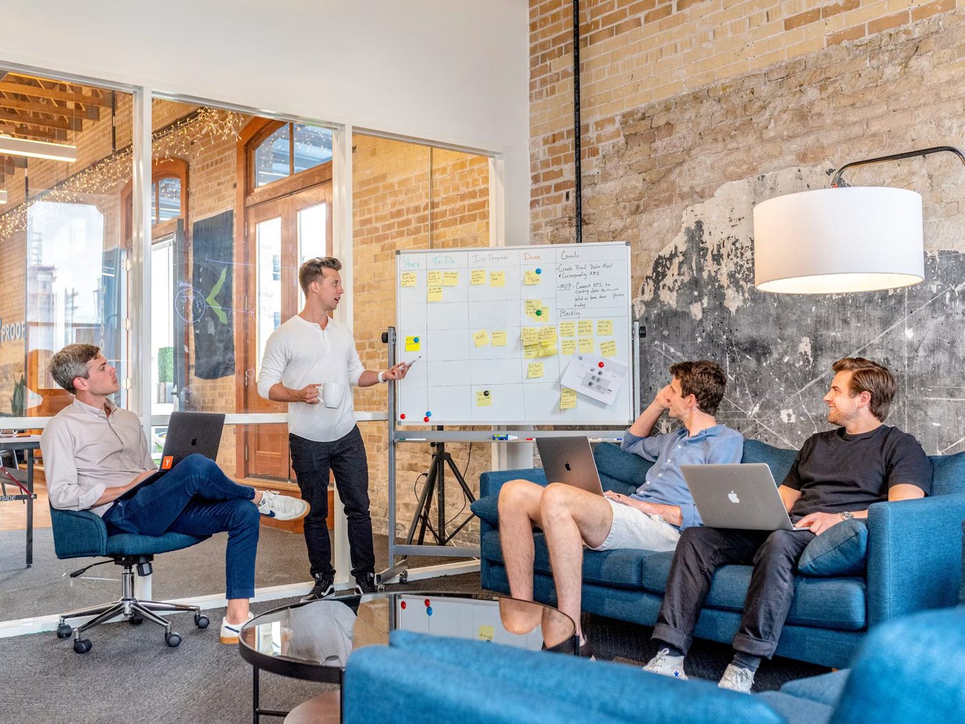 A strategist presenting a planning board to the team